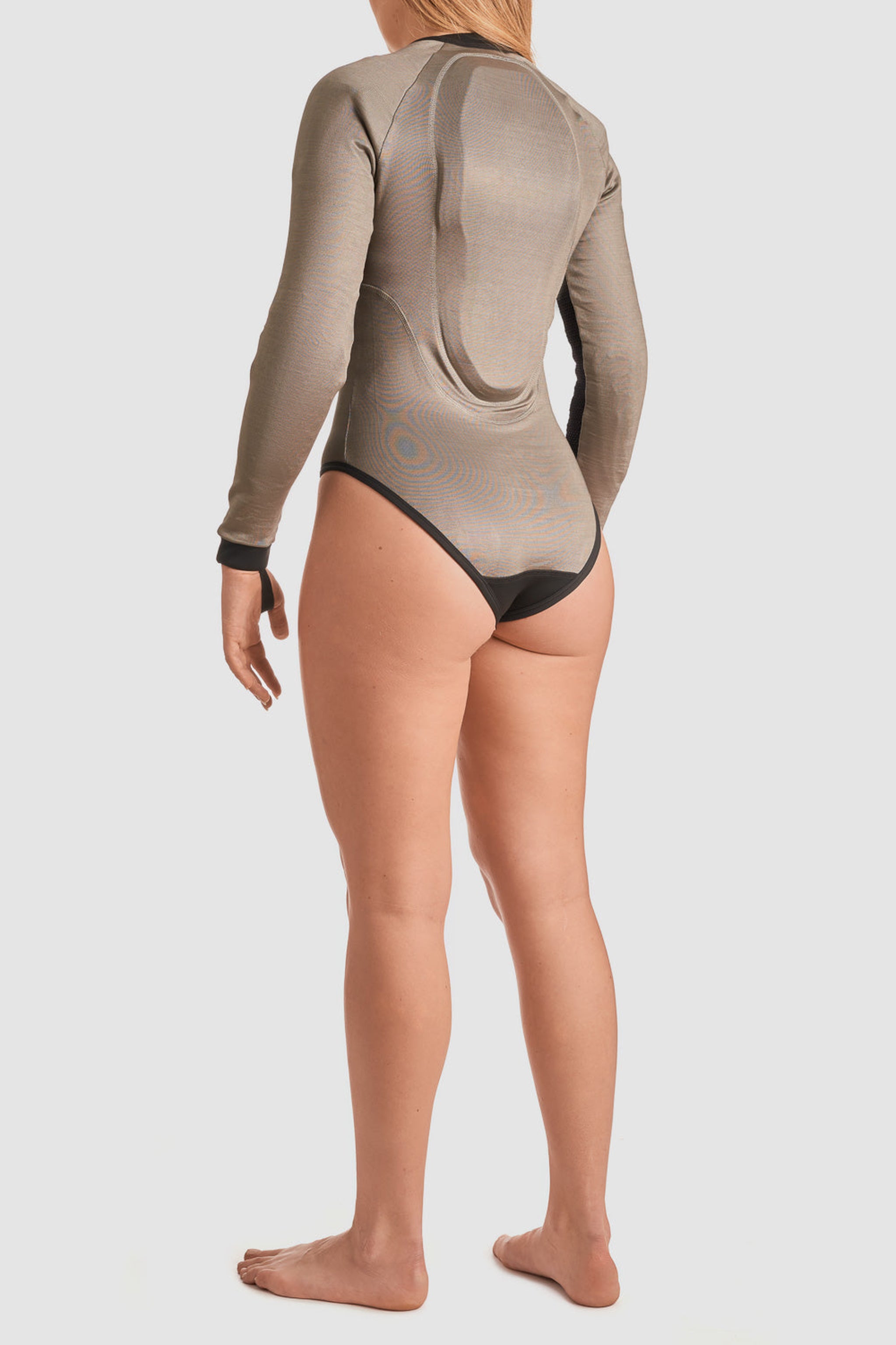 a back of a a woman wearing Black and grey moto bodysuit with Pando logo