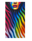 A rectangular beach towel featuring a vibrant, colorful graphic print of a woman's face and neck overlaid with rainbow-colored zebra stripes on a white background.