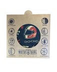 A circular fabric patch featuring a motorcycle racer helmet design, mounted on a kraft paper backing card with various feature icons and the Moto Girl brand name.