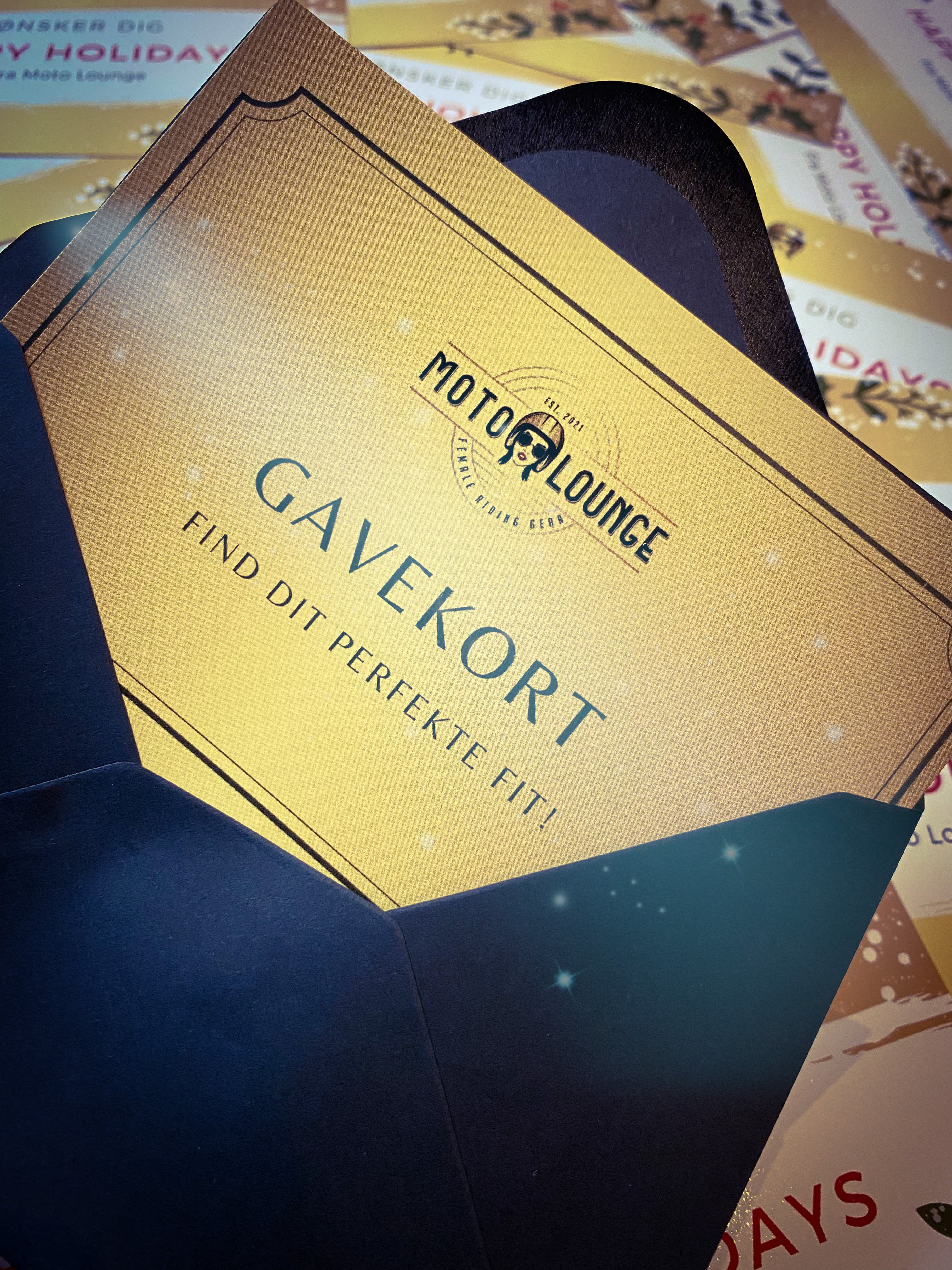 Moto Lounge gift card in a black envelope