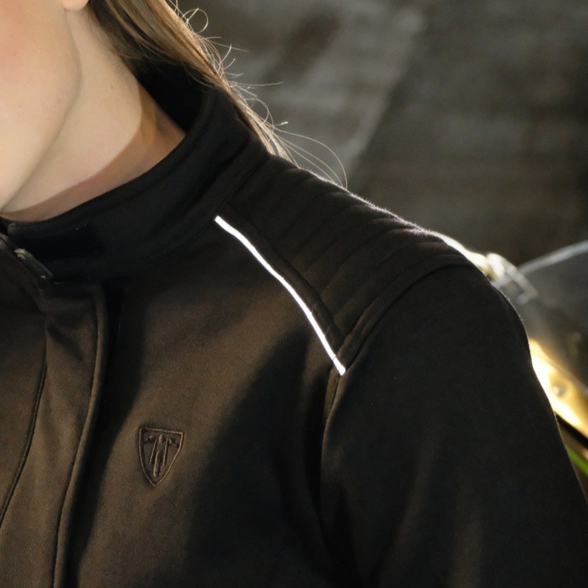 A reflective stripe a black motorcycle jacket from Moto Girl
