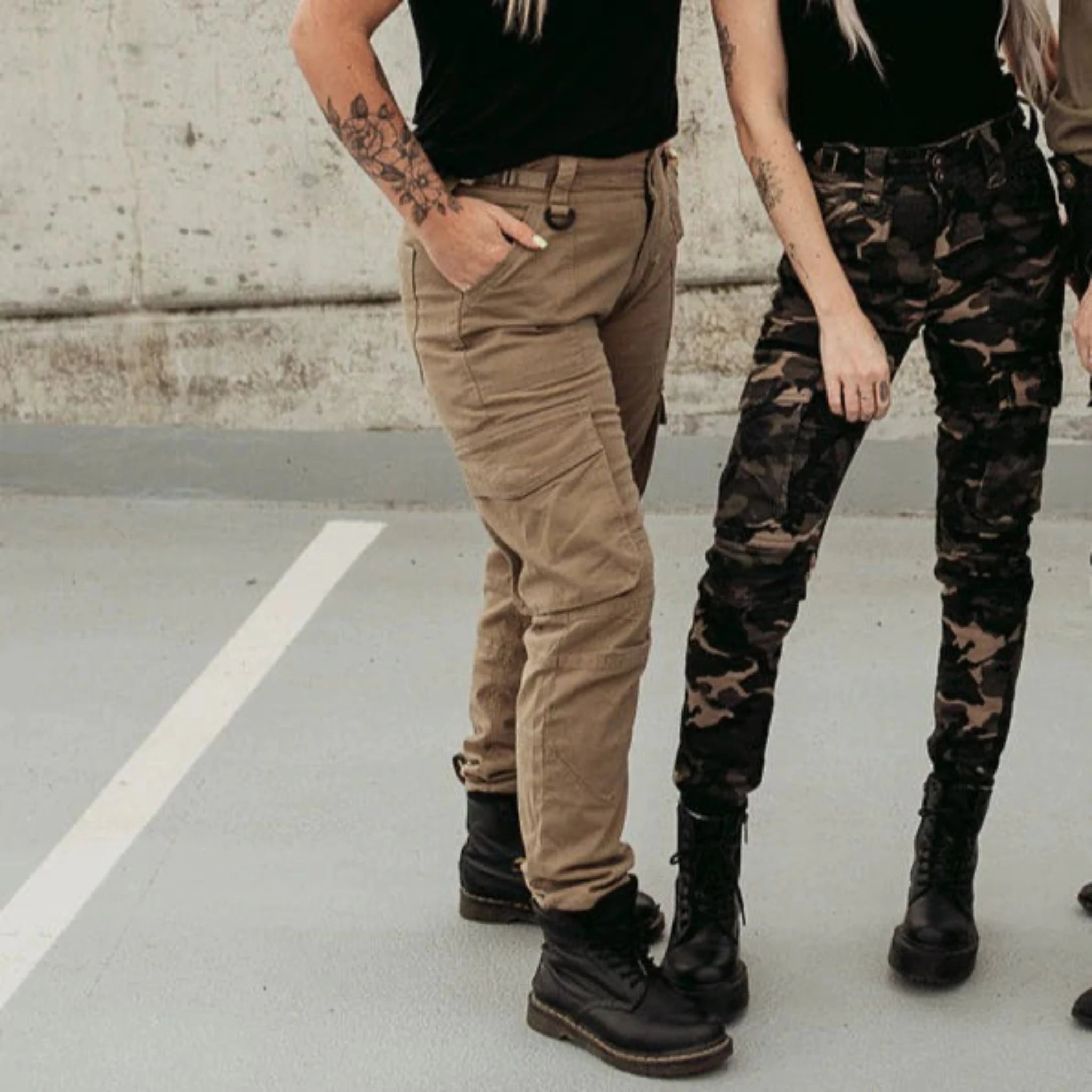 Women legs wearing beige and camo motorcycle cargo pants Lara from moto Girl