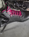 Rebel waterproof motorcycle sneakers with pink laces from Shima being zipped