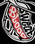 Black women's motorcycle t-shirt with red scull "sweet blood"motive close up