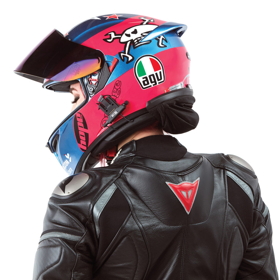 A woman wearing the helmet with the hightail bike hair protector
