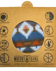 Astec bandana worn as a face mask with a red, brown, and blue print, displayed in its packaging that highlights its different functions, with the MotoGirl logo at the bottom.