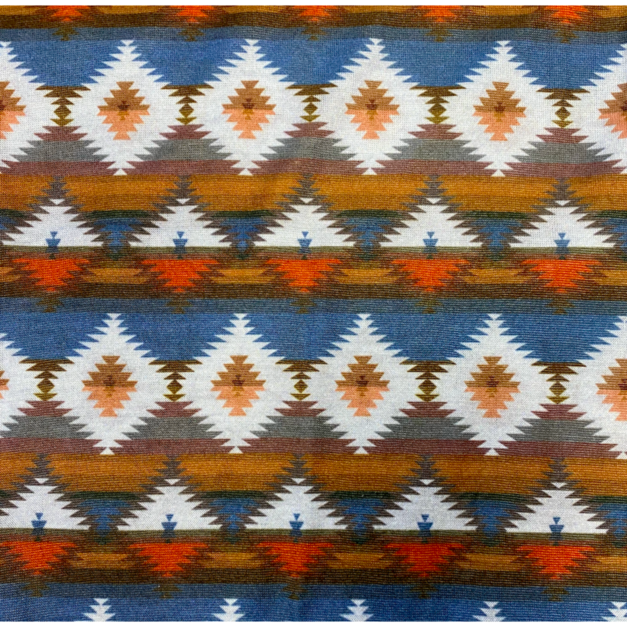 Close-up of the Astec bandana print featuring a print in shades of red, brown, and blue.