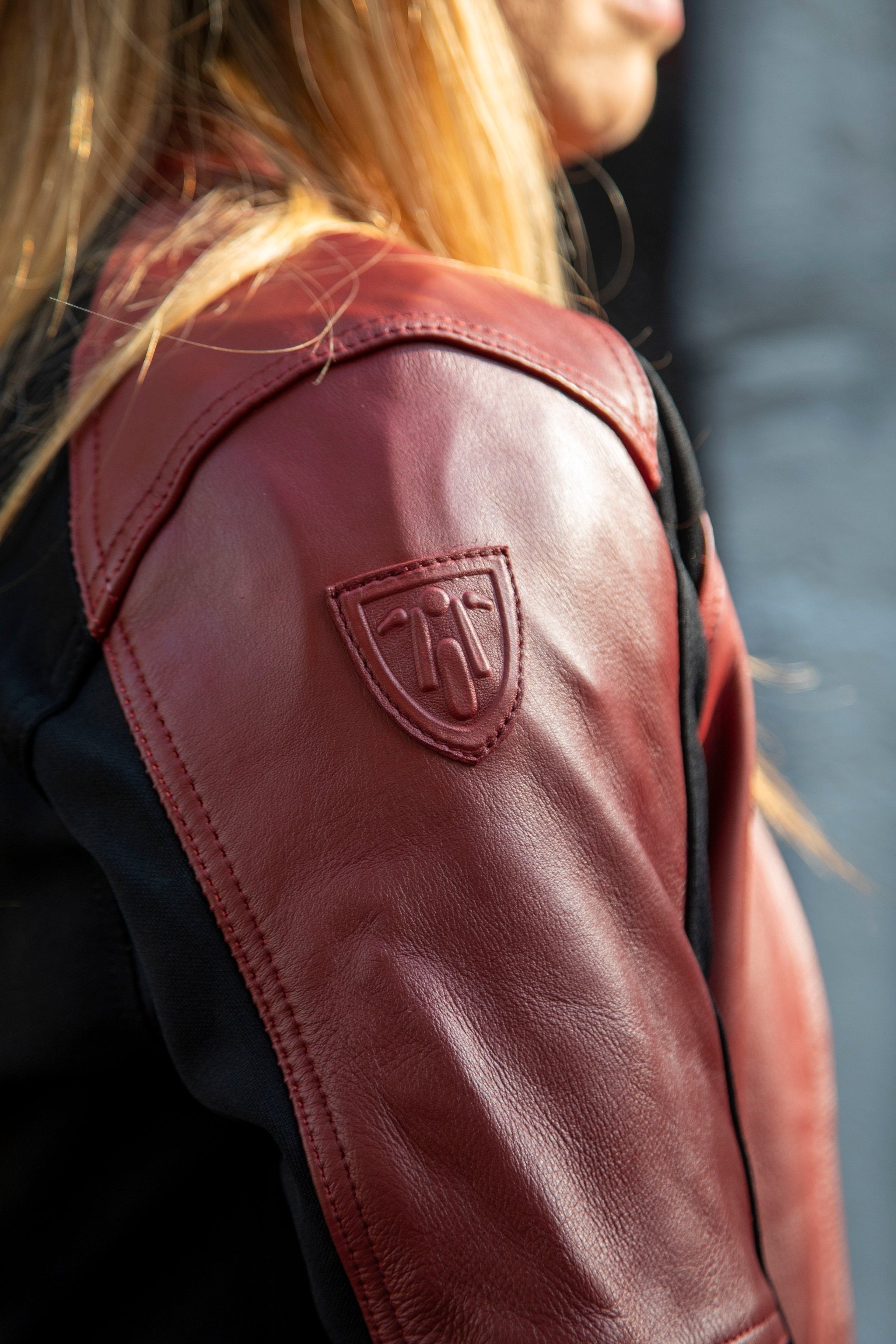 Close up of woman wearing Red Fiona Motorcycle Jacket from Moto Girl