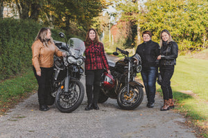 Four women with motorcycles 