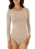 woman wearing round neck beige colour modal top 
