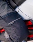 A close up of the leg zipper on the women motorcycle touring pants