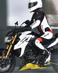 A woman on a white Suzuki motorcycle wearing SHIMA MOTORCYCLE LEATHER suit IN BLACK FLUO, WHITE AND RED FLUO