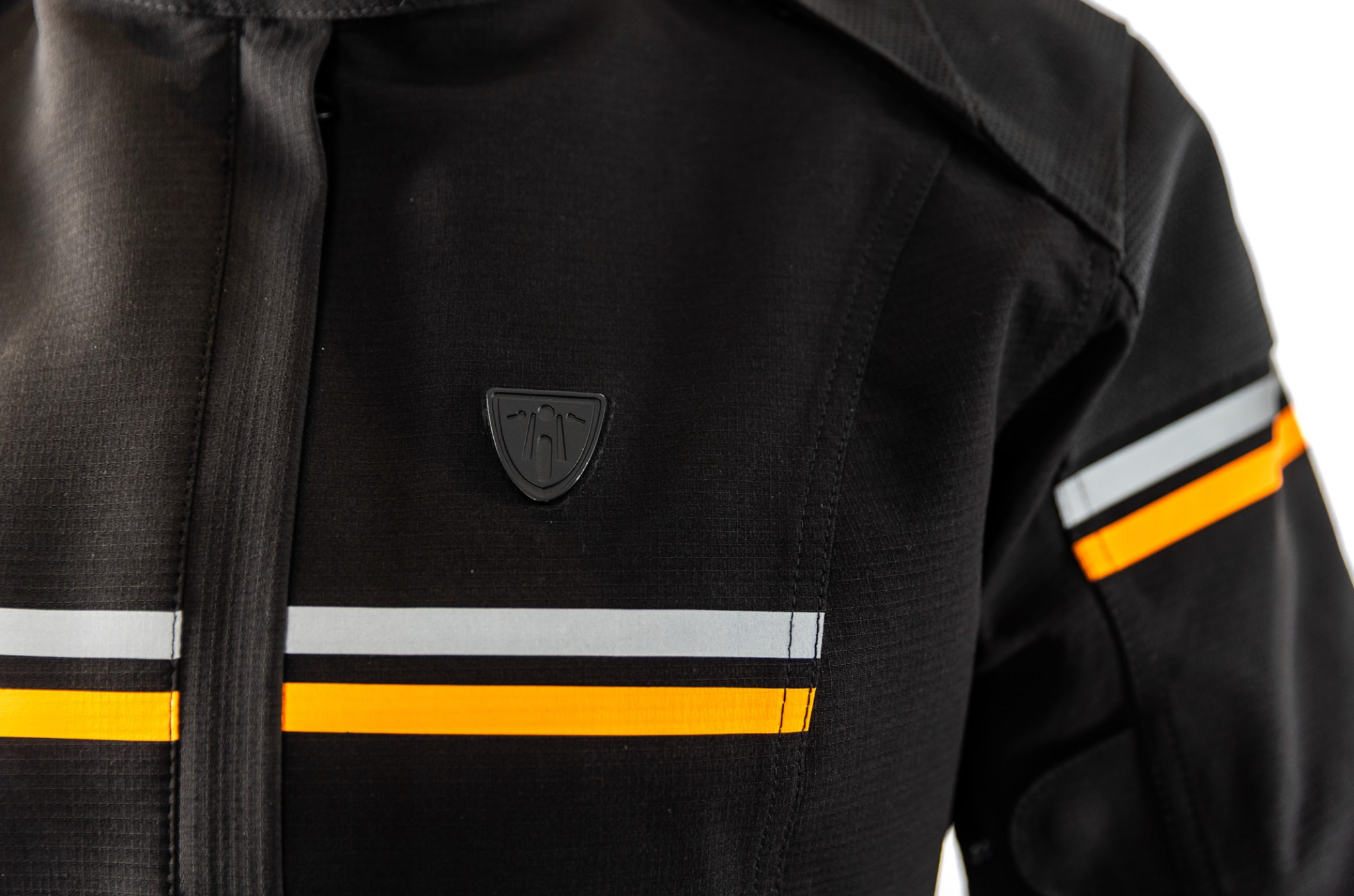 orange and grey details on black textile mc jacket 