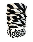 A black and white zebra-print neck gaiter with the word 'motogadget' printed in a stylized black font on the lower portion, shown against a plain white background.
