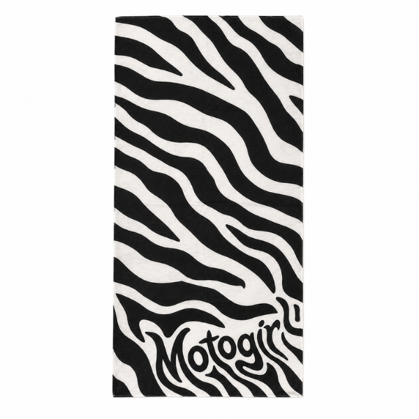 A rectangular beach towel featuring a bold black and white zebra stripe pattern, with the brand name 'Motogirl' printed in a stylized black font at the bottom, set against a plain white background.