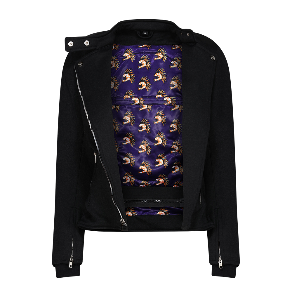 colourful inner lining of a  black retro style woman&#39;s motorcycle jacket with silver zip details 