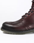 A close up of a toe of Women's motorcycle boot in burgundy from John Doe