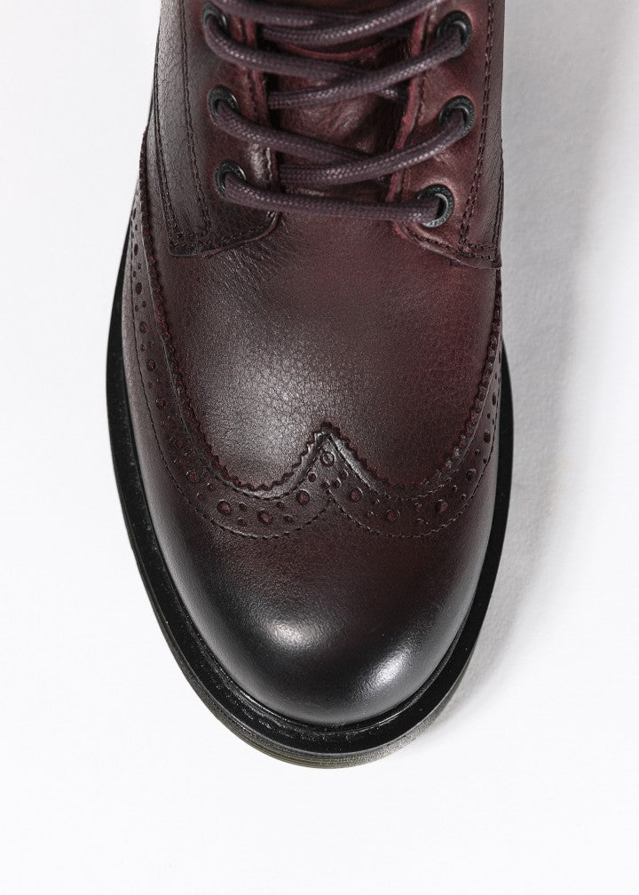 A close up of Women&#39;s motorcycle boot in burgundy from John Doe