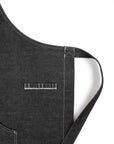 A close up of a stripe of Black denim apron Pando Moto 
