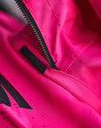A close up of the zipper on the pink motorcycle jacket from Shima