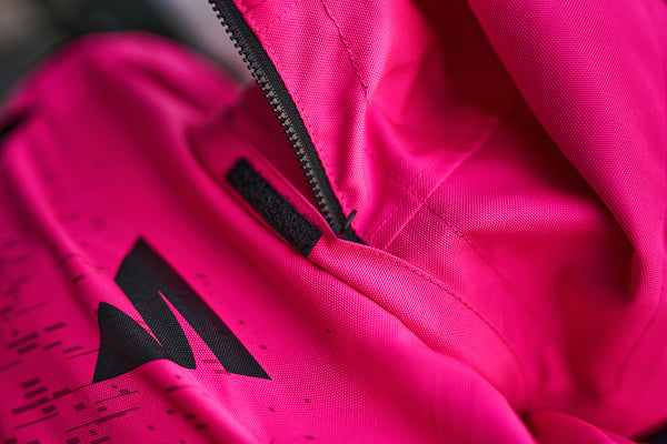 A close up of the zipper on the pink motorcycle jacket from Shima