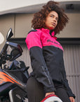 a young woman wearing pink DRIFT  motorcycle jacket from Shima