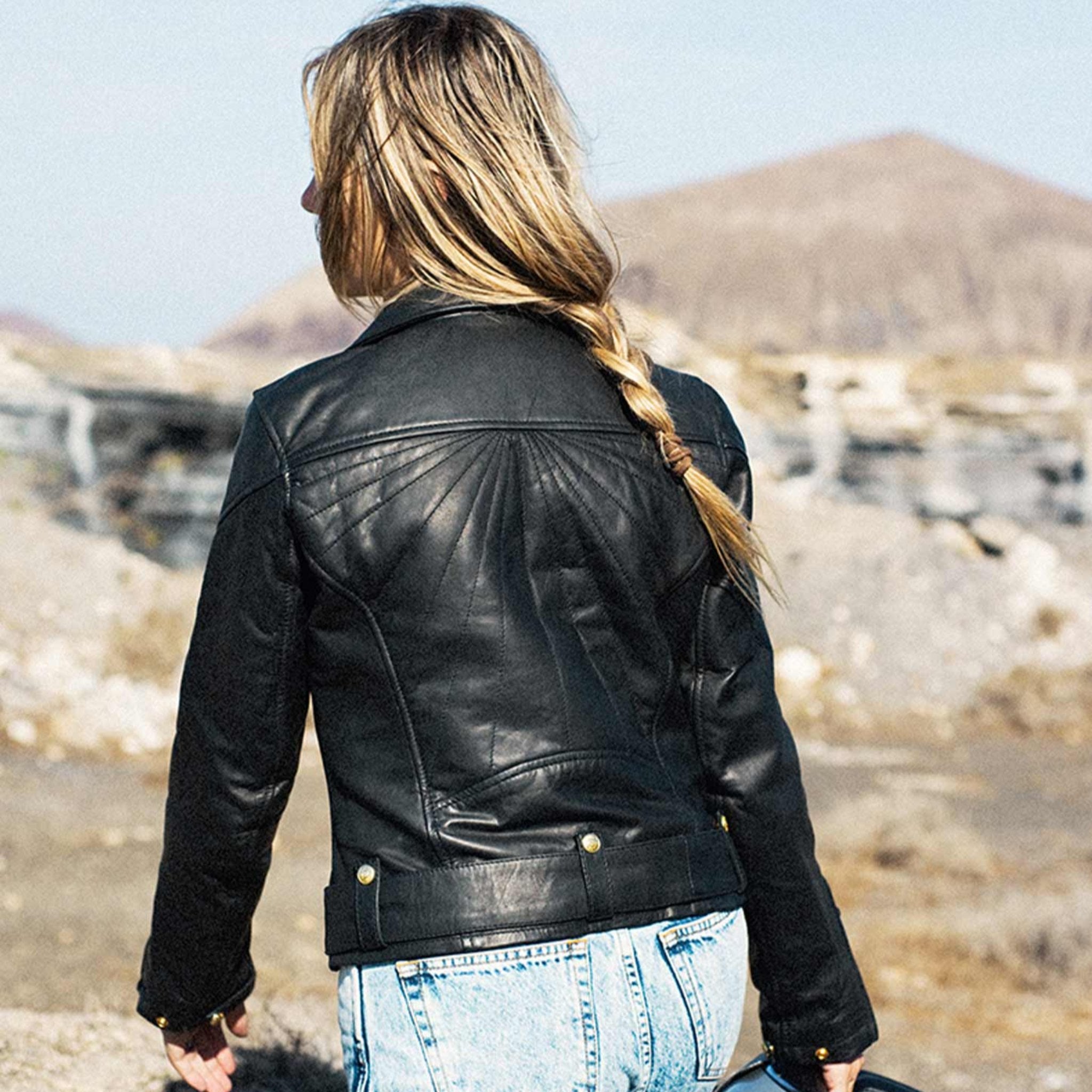 A women from the back wearing Classic retro black women's motorcycle jacket from Eudoxie