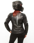 A woman posing with Black leather women's motorcycle jacket with reflectors from Moto Girl 