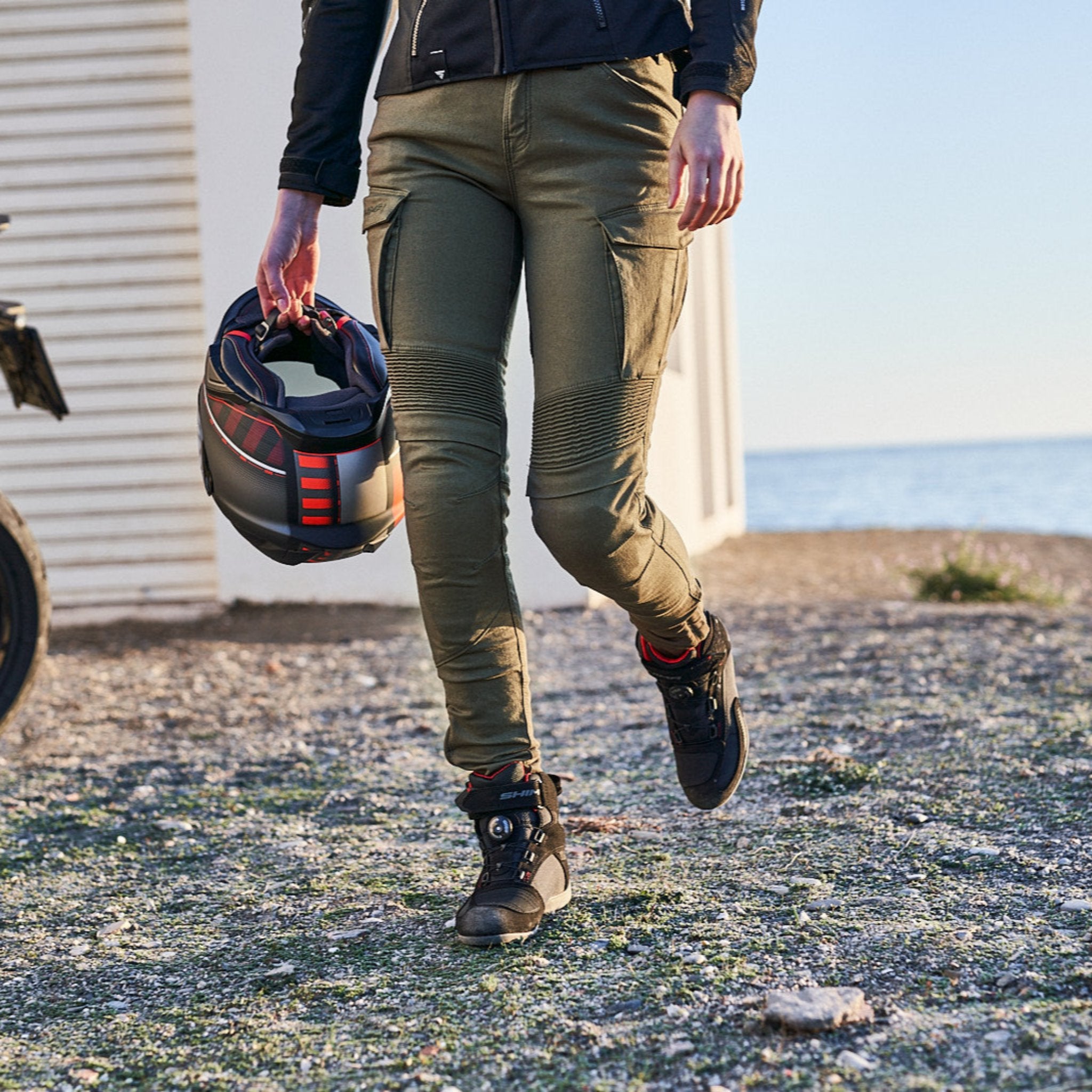 woman's legs wearing Khaki green women's motorcycle cargo pants GIRO from shima