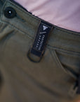 A close up of the protective apparel patch on the Khaki green women's motorcycle cargo pants GIRO from shima