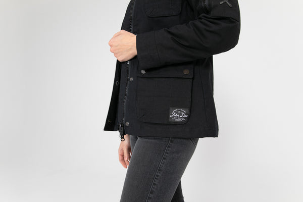 a close up of the pocket on  BLACK army style women's motorcycle jacket from John Doe