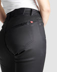 a woman's bottom wearing black women's motorcykle kelvar jeans Kusari Kev 02 from Pando Moto 