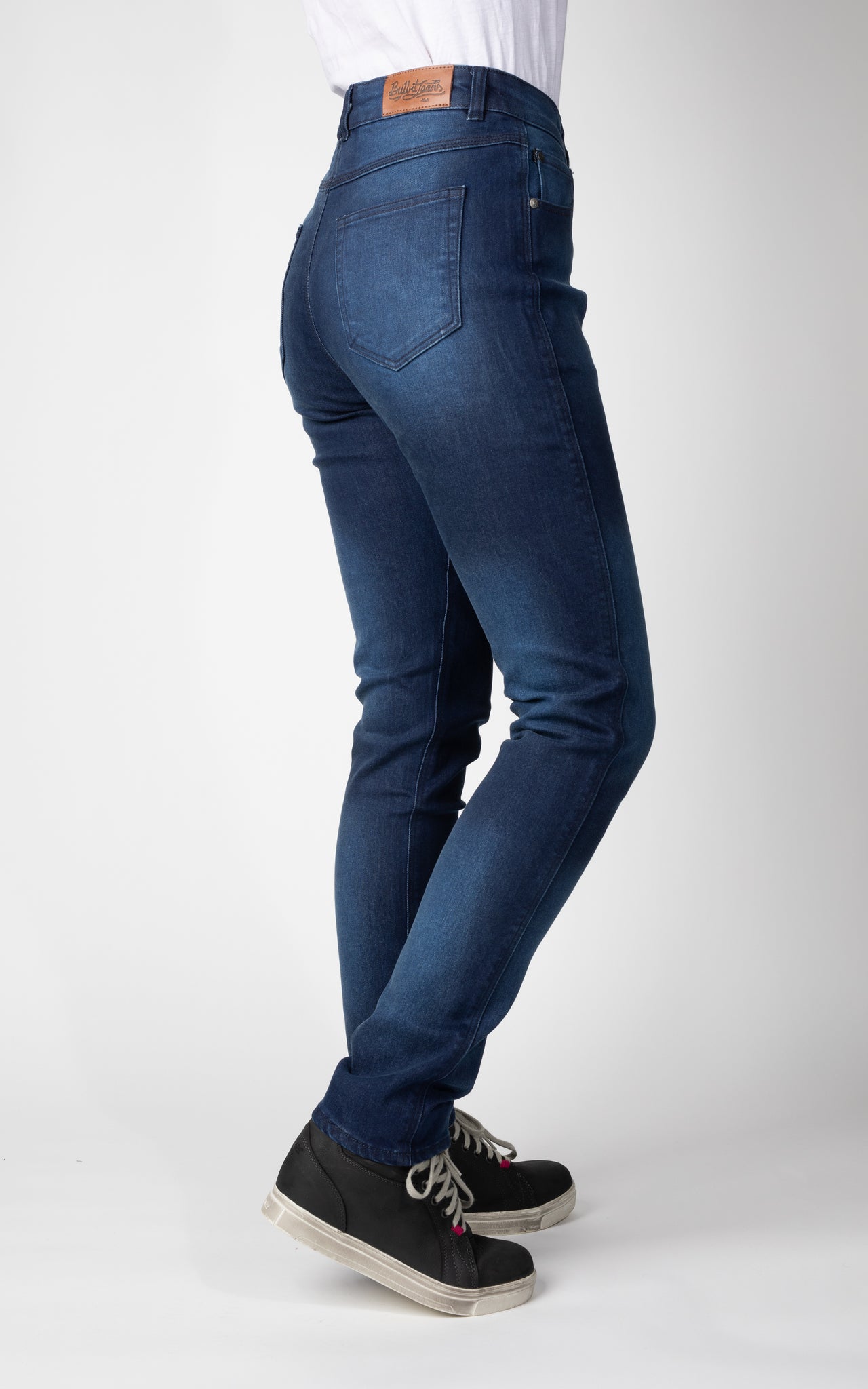 Woman&#39;s legs from behind wearing blue lady motorcycle jeans from Bull-it