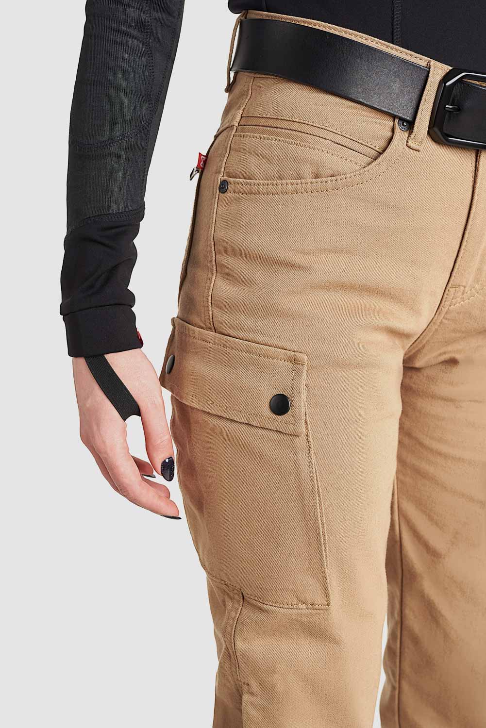 a close up of the cargo pocket on the beige lady mc pants