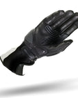 The inner black side of a white Shima female motorcycle glove 