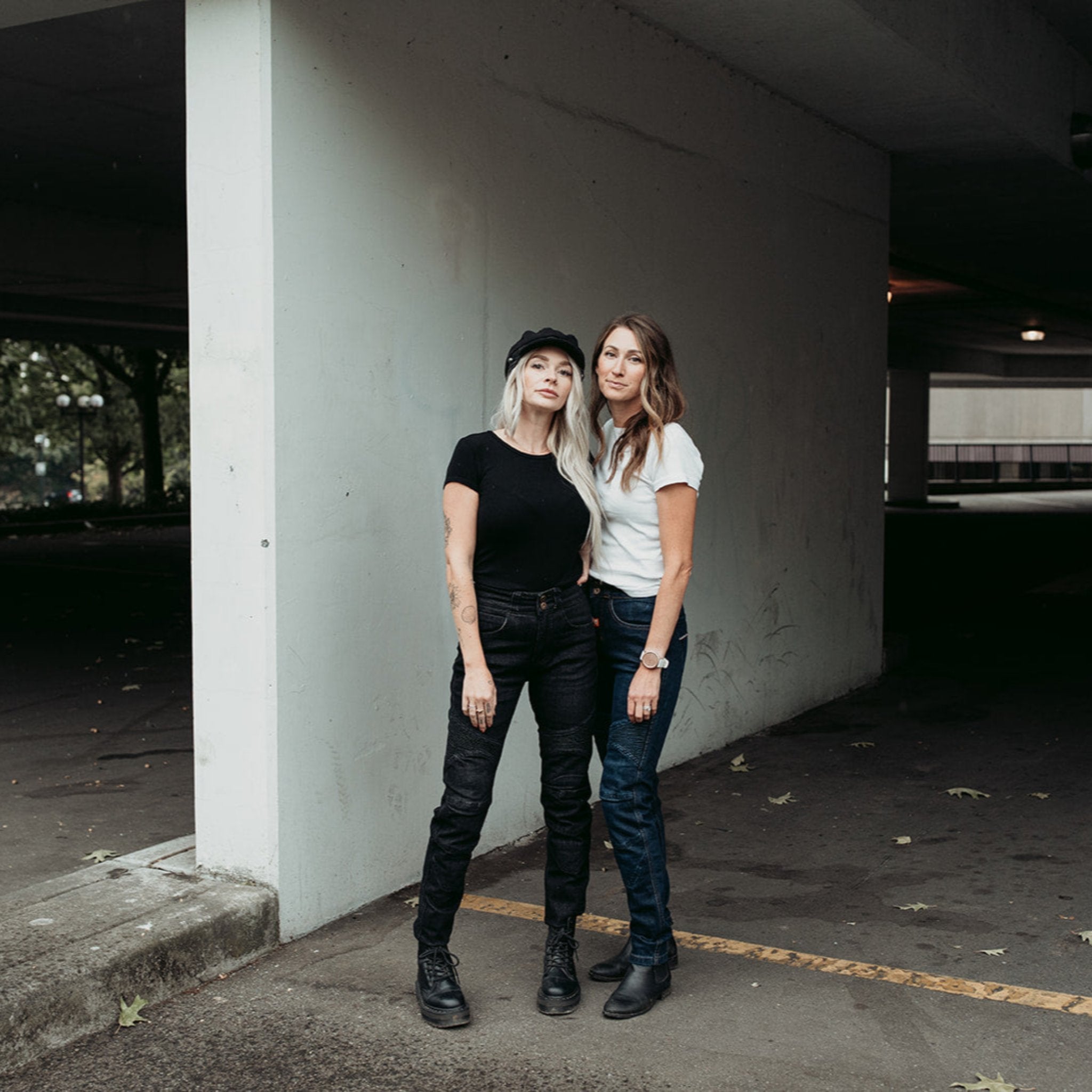 Two women wearing black and blue lady motorcycle jeans from Moto Girl.