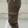 A close up of the pocket on olive green women's motorcycle pants from Motogirl