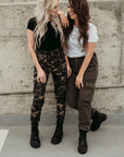 Two young women wearing motorcycle cargo pants from Moto girl 