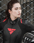 A young woman wearinh Black and red women's motorcycle racing suit from Shima