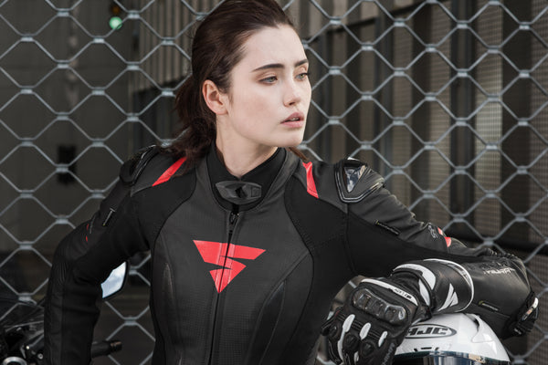 A young woman wearinh Black and red women's motorcycle racing suit from Shima