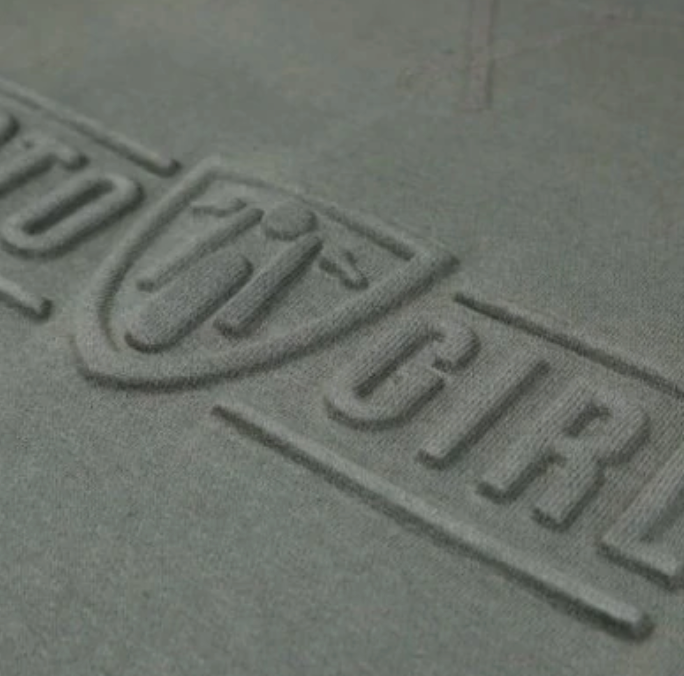 A close up of the 3d logo on a women's motorcycle sweatshirt from Moto Girl