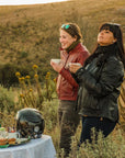 Women having coffee on a motorcycle trip wearing Valerie motorcycle leather jacket from Moto Girl