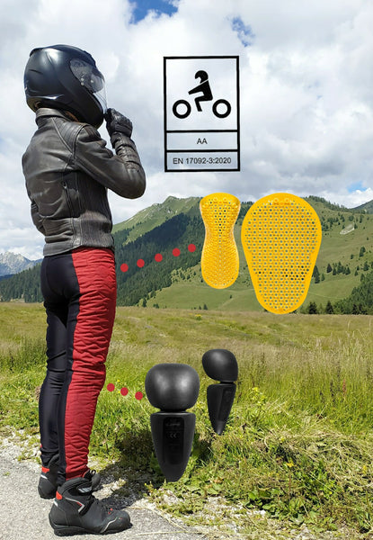 A woman wearing black and red women's motorcycle leggings from exagon66