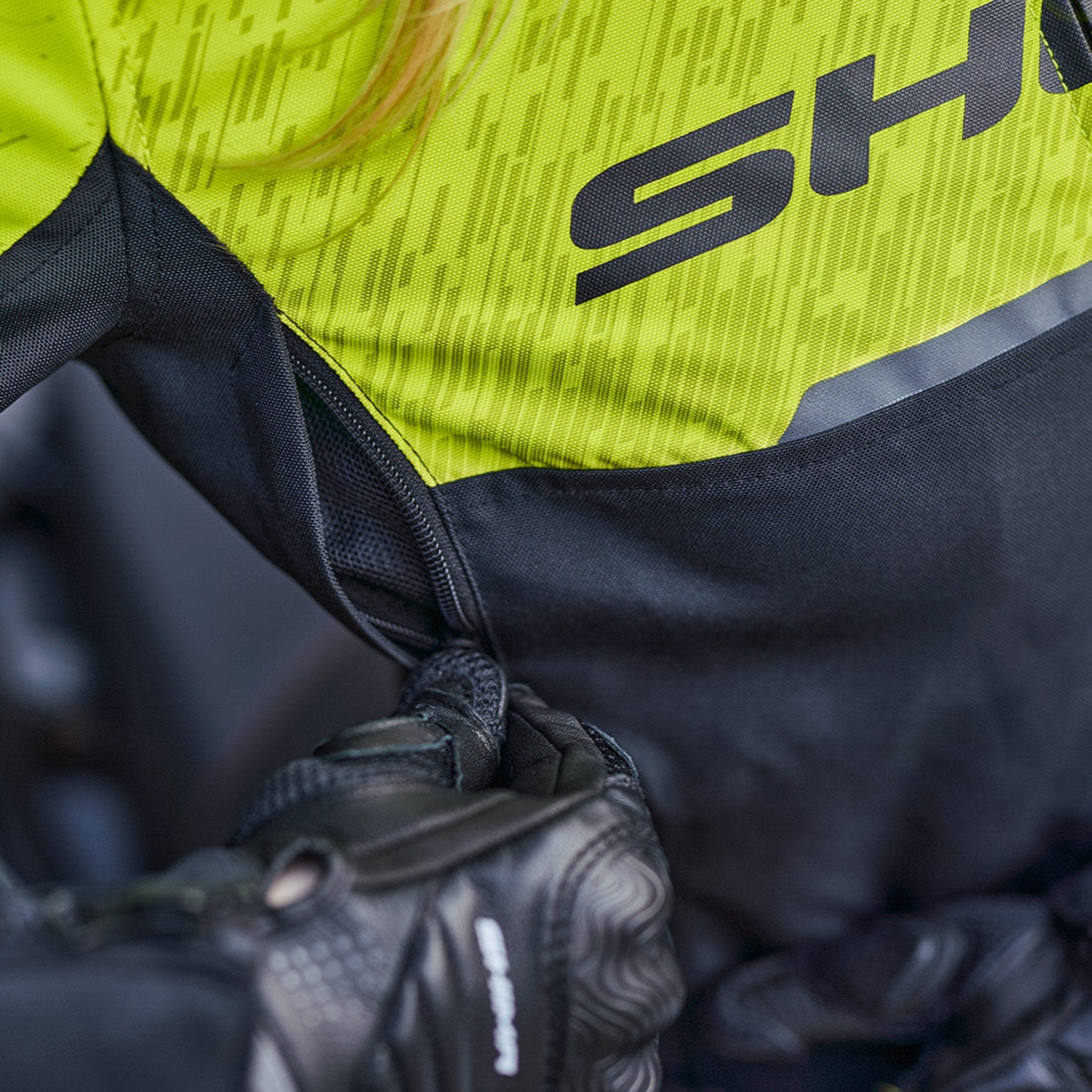 Close up of fluo color women's motorcycle jacket from SHIMA