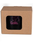 A black mug with logo Ï ride like a girl in a box