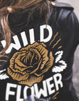 motorcycle leather jacket for women from Eudoxie with the wild flower illustration on the back