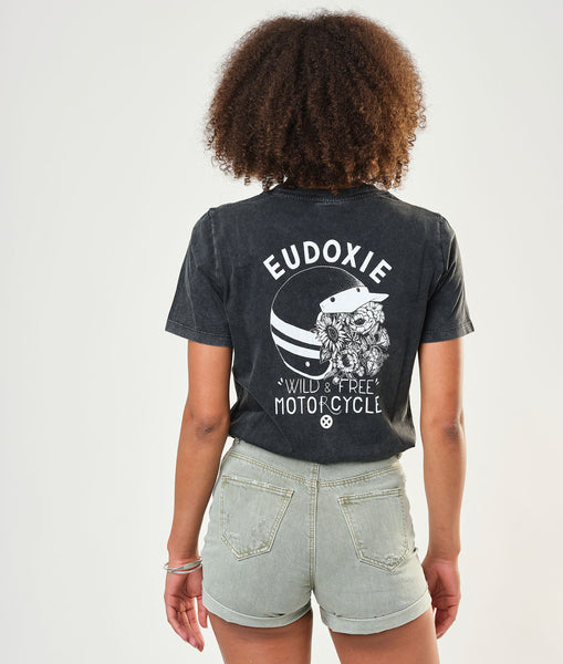 A woman wearing Eudoxie women t-shirt with motorcycle motives 