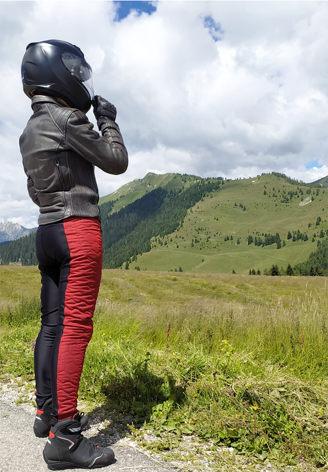 A woman wearing black and red women&#39;s motorcycle leggings from exagon66